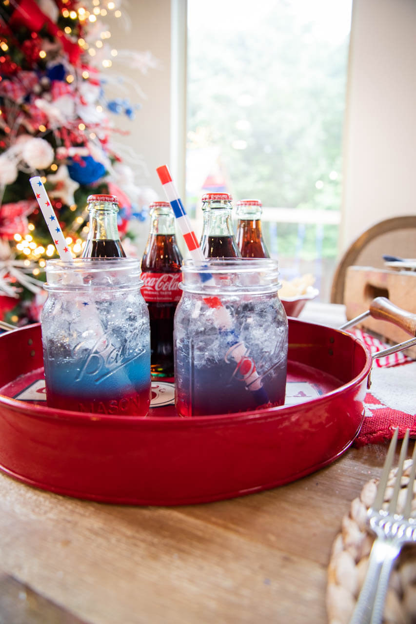 Drink with white, blue, and red layers