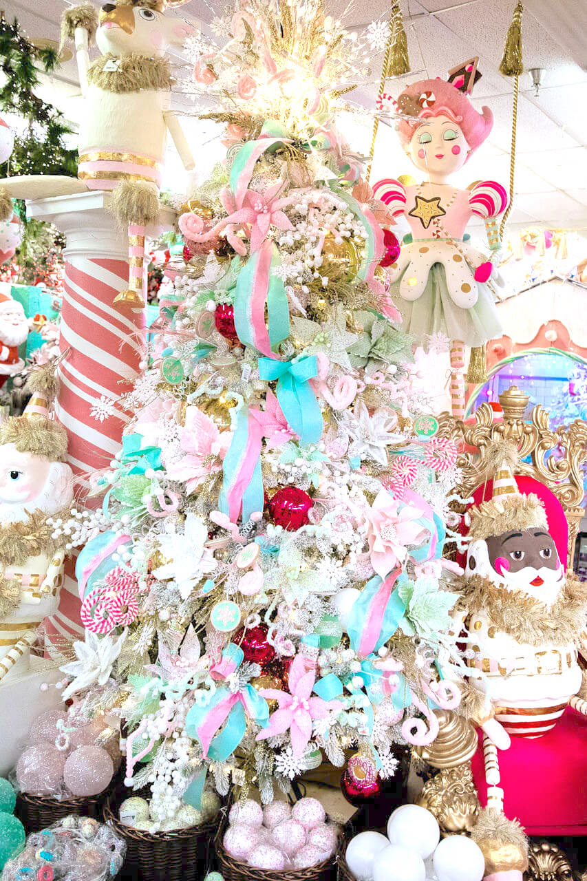 in-store pastel Christmas tree with Glitterville figurines